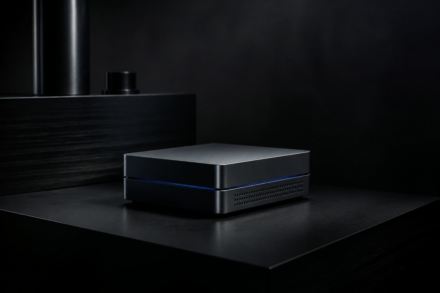 A single compact storage module glowing on a dark metal bench